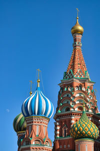 Low angle view of traditional building against clear blue sky