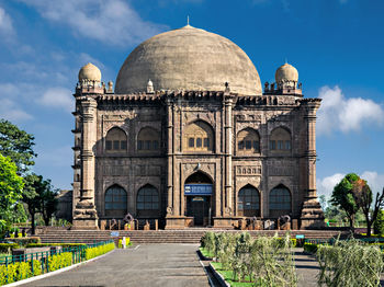 View of historical building against cloudy sky