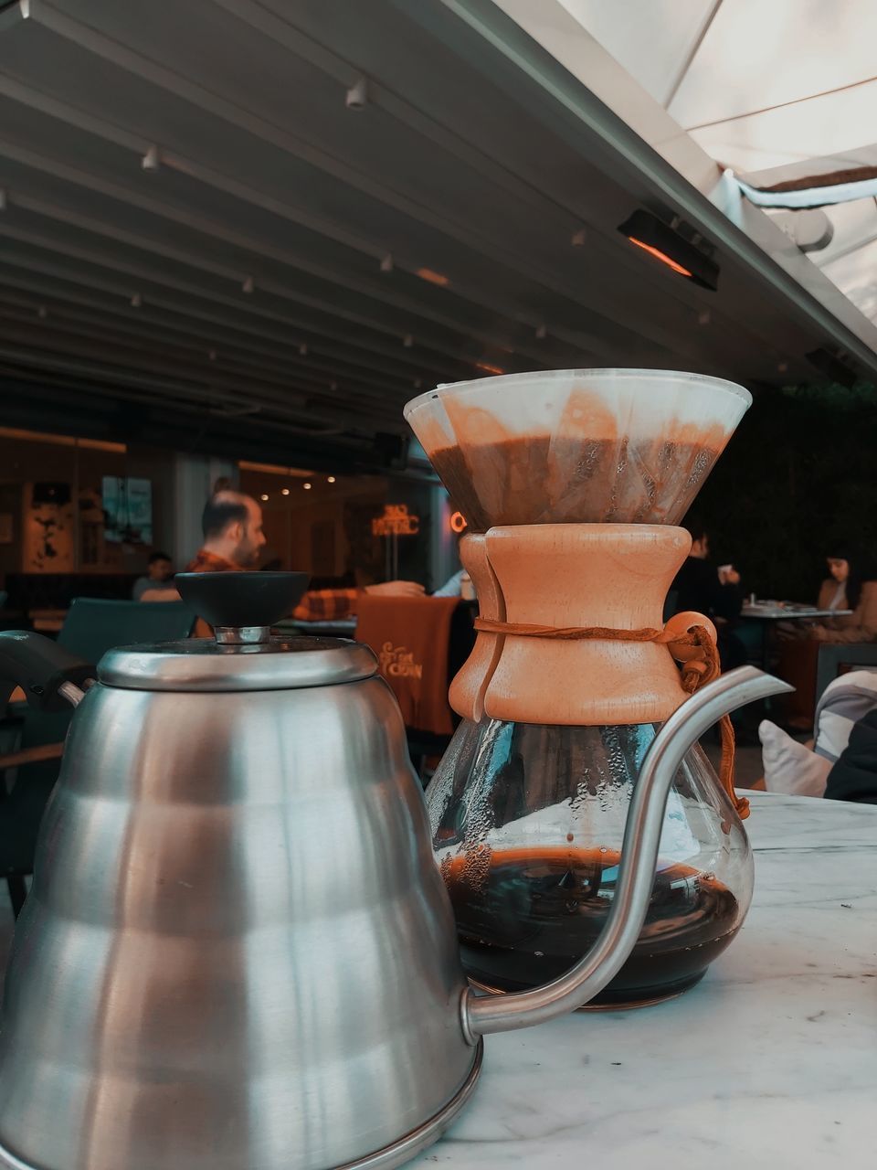 CLOSE-UP OF COFFEE SERVED ON TABLE