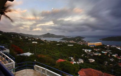 Scenic view of mountains against cloudy sky