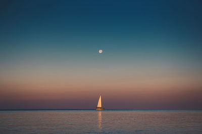 Scenic view of seascape against sky during sunset