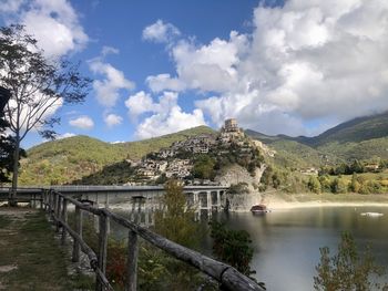 Bridge over river against sky