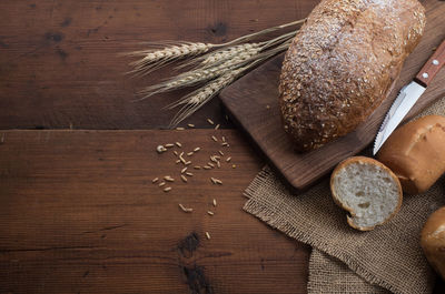 High angle view of bread on cutting board