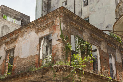 Low angle view of old building against sky