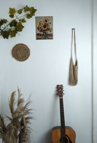 Clothes drying on table against wall at home