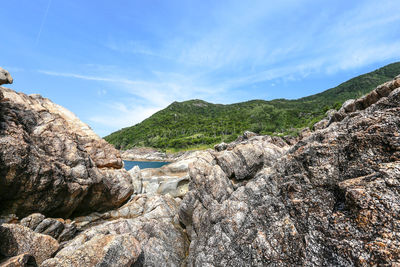 Panoramic view of rock formations against sky