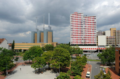 Buildings in city against sky