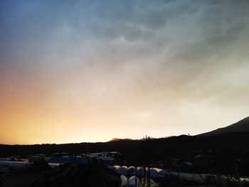 Scenic view of silhouette landscape against sky during sunset