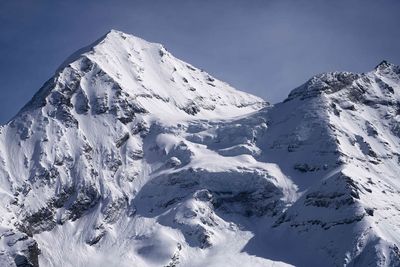 Snowcapped mountains against sky