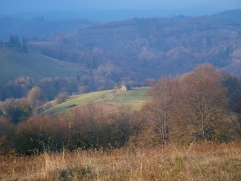 Landscape with mountain range in background