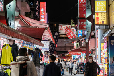 People on street market in city