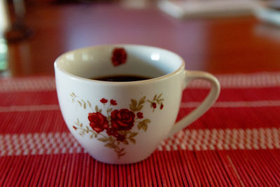 Close-up of tea cup on table