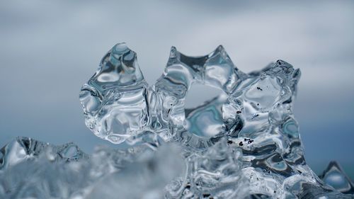 Close-up of ice against white background