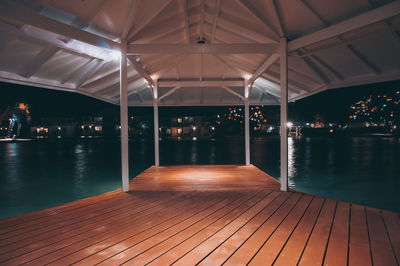 Empty swimming pool at night