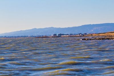 Scenic view of sea against clear sky