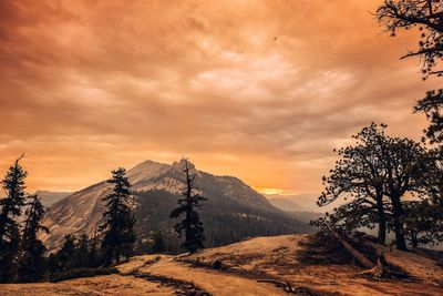 Scenic view of landscape against sky during sunset