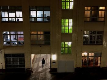 Woman standing in front of building