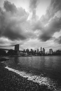 Brooklyn bridge against buildings in city