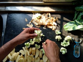 High angle view of person preparing food outdoors