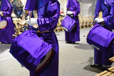 Low section of women walking on floor