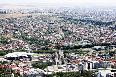 High angle view of townscape against buildings in city