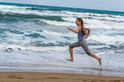 Full length of woman on beach