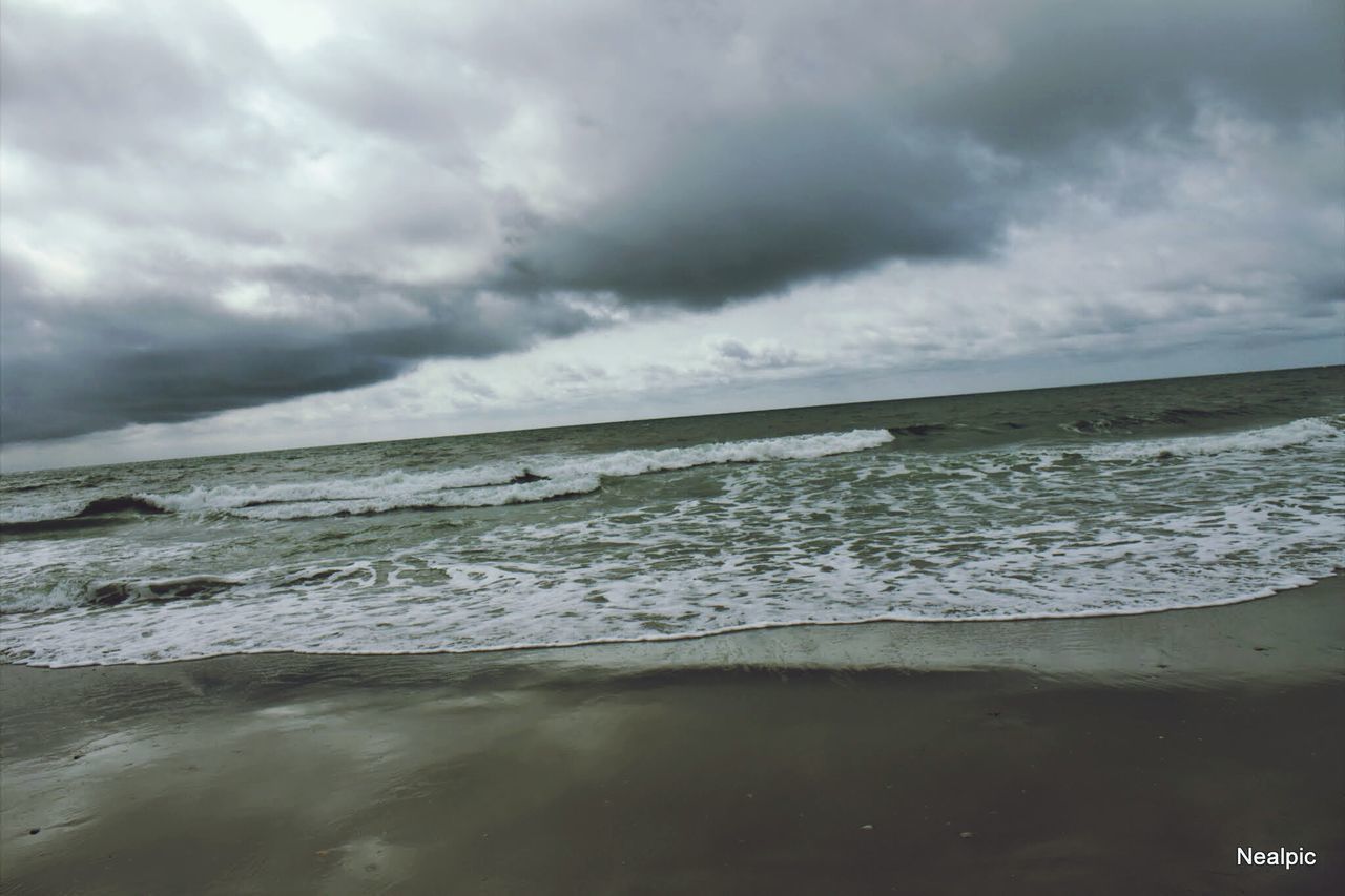 sky, sea, water, cloud - sky, cloudy, beach, horizon over water, tranquil scene, scenics, tranquility, beauty in nature, weather, overcast, shore, nature, cloud, storm cloud, wave, idyllic, sand