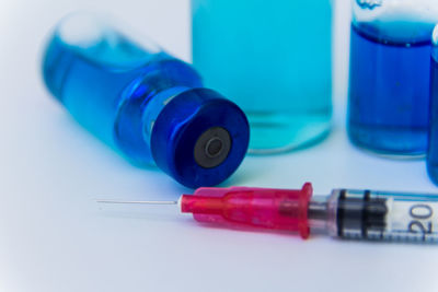 Close-up of blue paint on table