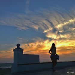 Scenic view of sea at sunset