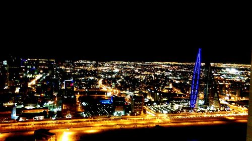 High angle view of illuminated city at night