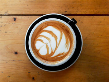 High angle view of cappuccino on table