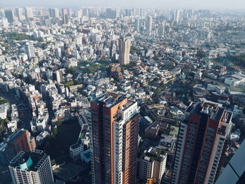 High angle view of modern buildings in city