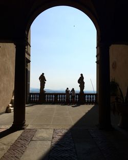 Silhouette of people at seaside