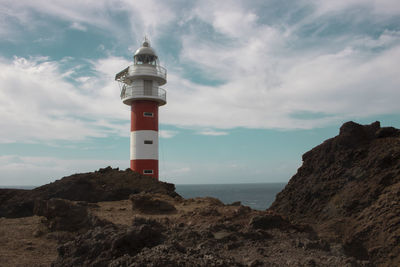 Landscape showing a lighthouse in the coast in punta del teno in tenerife island in spain