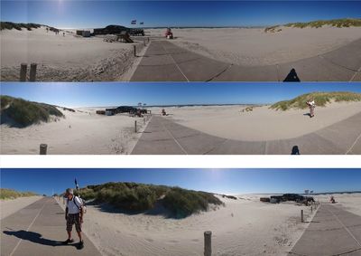 People on land against sky