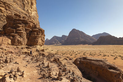 Scenic view of desert against clear sky