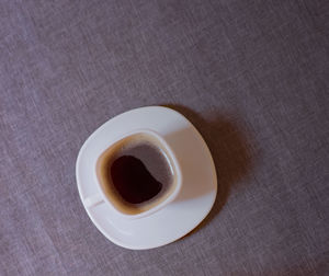 High angle view of coffee cup on table