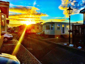 Sun shining through buildings