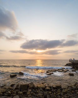 Scenic view of sea against sky during sunset