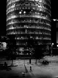 Buildings in city at night