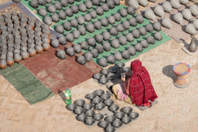 High angle view of woman making earthenware