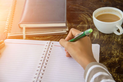 High angle view of coffee cup on table