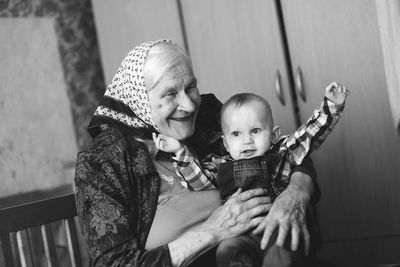 Grandmother with grandson at home