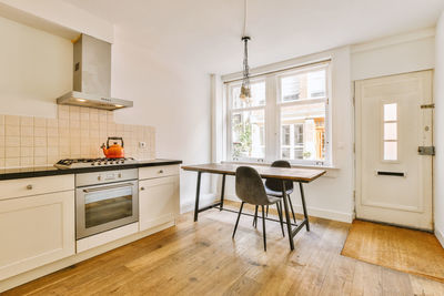 Empty chairs on floor at home