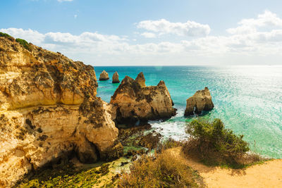 High level view of rugged coastline, alvor, algarve, portugal, europe