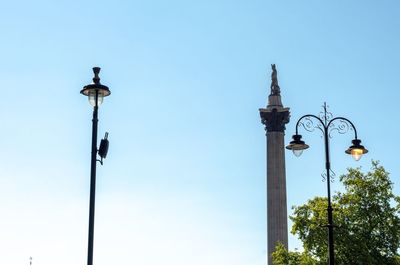 Low angle view of street light against sky