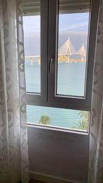 Sea seen through glass window