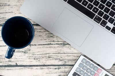 High angle view of coffee cup on table