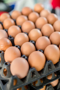 Close-up of eggs for sale at market stall