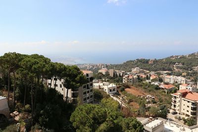 High angle view of residential district against sky